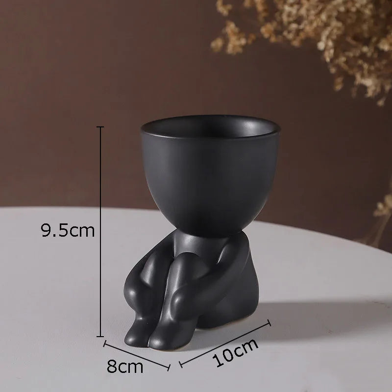 minimalist art figure planter