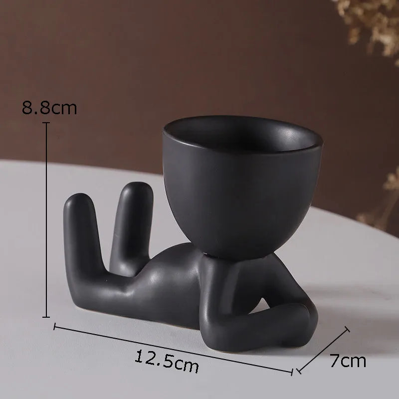 minimalist art figure planter
